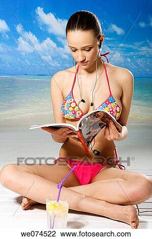 beach, browse, browsing, brunette View Large Photo Image Stock Image - beach, browse, browsing, brunette. Fotosearch