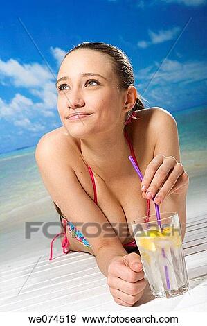 beach, brunette, absorbed View Large Photo Image Stock Photo - beach, brunette, absorbed. Fotosearch