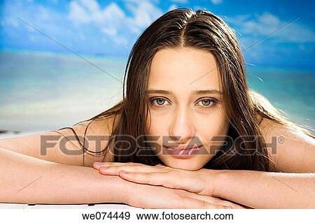 Stock Photo - beach, brunette, Close-up. Fotosearch