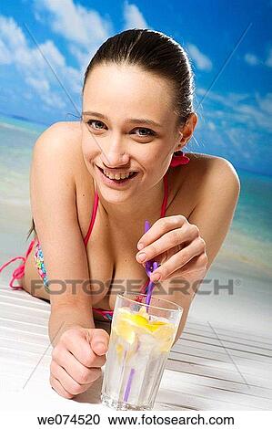 beach, brunette, cold drink View Large Photo Image Stock Image - beach, brunette, cold drink. Fotosearch