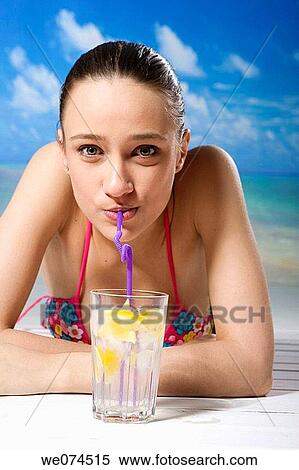 beach, brunette, cold drink View Large Photo Image Stock Photography - beach, brunette, cold drink. Fotosearch