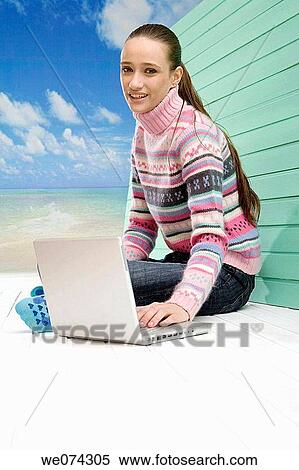 beach, brunette, computer View Large Photo Image Stock Photography - beach, brunette, computer. Fotosearch