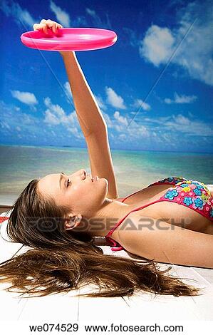 Stock Photo - beach, brunette. Fotosearch
