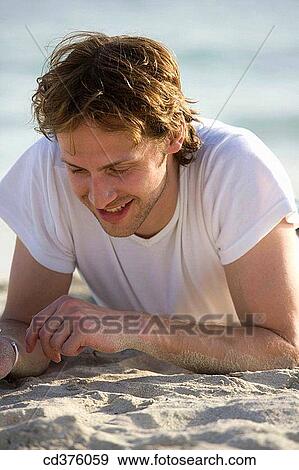 beach, calm, absorbed View Large Photo Image Stock Photo - beach, calm, absorbed. Fotosearch