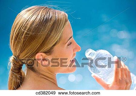 beauty, blue, bottle, brown hair View Large Photo Image Stock Photo - beauty, blue, bottle, brown hair. Fotosearch