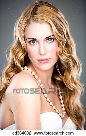 Stock Image - beauty, blue eyes, blond, Beauty Care, attractive. Fotosearch