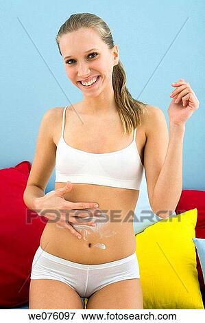 belly, Body care, apply View Large Photo Image Stock Photo - belly, Body care, apply. Fotosearch