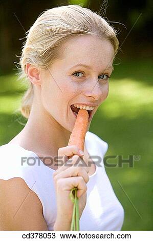 bite, biting, blond, carrot View Large Photo Image Stock Image - bite, biting, blond, carrot. Fotosearch