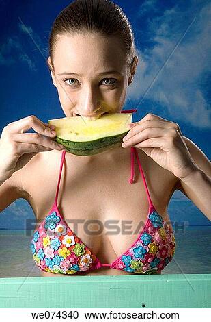 bite, biting, brunette View Large Photo Image Stock Image - bite, biting, brunette. Fotosearch