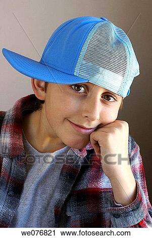black hair, boy, brown, cap, cheerful View Large Photo Image Stock Image - black hair, boy, brown, cap, cheerful. Fotosearch