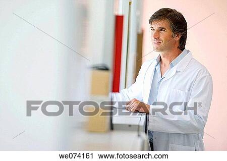 Stock Image - black hair, dark hair, absorbed. Fotosearch