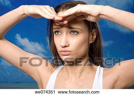 blinded, brunette, Arms raised View Large Photo Image Stock Image - blinded, brunette, Arms raised. Fotosearch