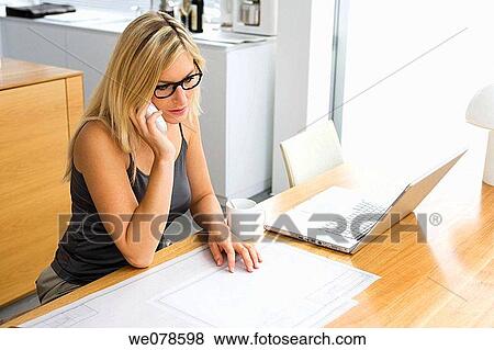 Stock Photo - blond, blueprint, business, calling. Fotosearch