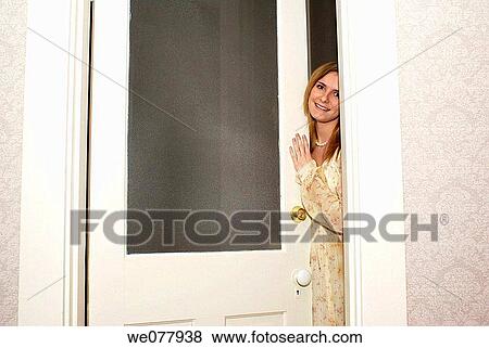 Stock Photo - blond, closing, at-home. Fotosearch