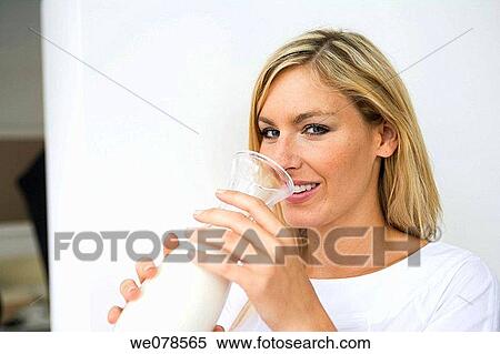 blond, drink, Facial expression View Large Photo Image Stock Photography - blond, drink, Facial expression. Fotosearch