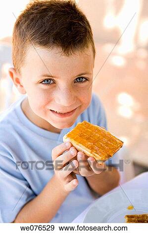 blue eyes, boy, breakfast, child, childhood View Large Photo Image Stock Photo - blue eyes, boy, breakfast, child, childhood. Fotosearch
