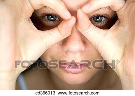 Stock Image - blue eyes, Close-up, amusing. Fotosearch