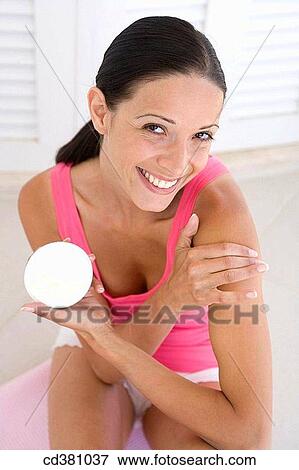 Body care, brunette, apply View Large Photo Image Stock Photo - Body care, brunette, apply. Fotosearch