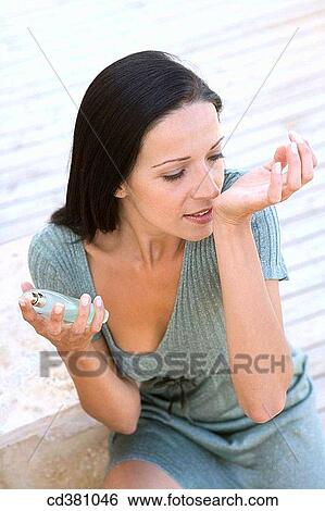 Body care, brunette, bottle, aroma View Large Photo Image Stock Photograph - Body care, brunette, bottle, aroma. Fotosearch
