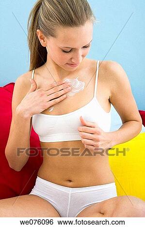 Body care, chest, apply View Large Photo Image Stock Photograph - Body care, chest, apply. Fotosearch