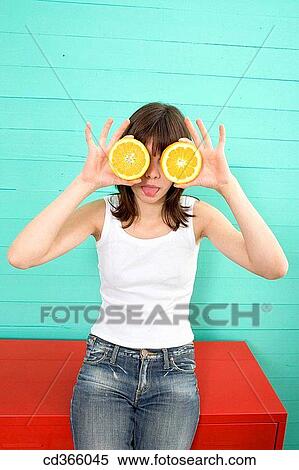 bold, Citrus fruit, brunette, boldness, amusing View Large Photo Image Stock Photography - bold, Citrus fruit, brunette, boldness, amusing. Fotosearch