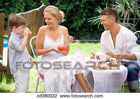 Stock Image - boy, breakfast, chair, child. Fotosearch
