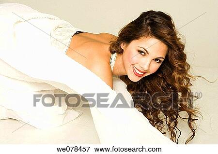 Stock Photo - bride, brown hair, carnality. Fotosearch