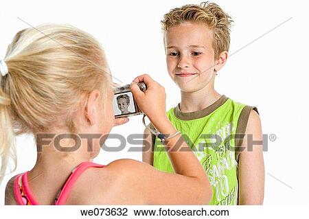 Brother and sister making photos of each other View Large Photo Image Stock Image - Brother and sister making photos of each other. Fotosearch