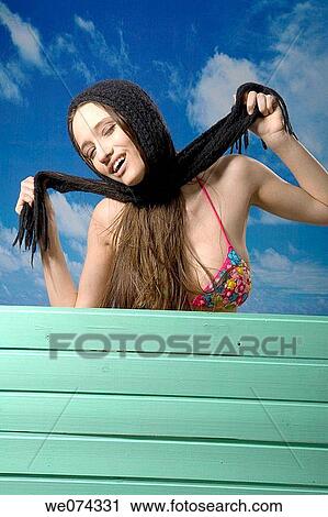 Stock Image - brunette, accessory. Fotosearch