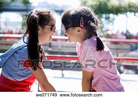 brunette, childhood, child, amusement View Large Photo Image Stock Photo - brunette, childhood, child, amusement. Fotosearch