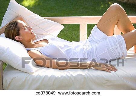 brunette, chilling out, calm, absorbed View Large Photo Image Stock Photo - brunette, chilling out, calm, absorbed. Fotosearch