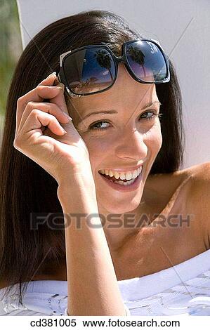 Stock Photography - brunette, Close-up, accessory. Fotosearch