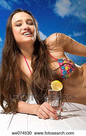 brunette, cold drink View Large Photo Image Stock Image - brunette, cold drink. Fotosearch