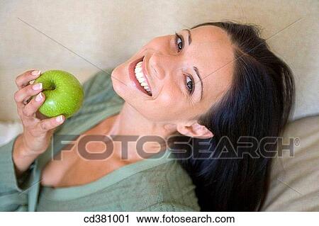 brunette, contemporary, apple View Large Photo Image Stock Image - brunette, contemporary, apple. Fotosearch