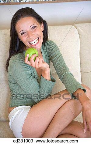 brunette, contemporary, apple View Large Photo Image Stock Photo - brunette, contemporary, apple. Fotosearch