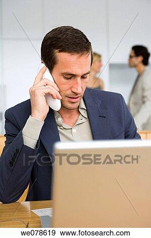 Stock Photo - business, calling, colleague. Fotosearch