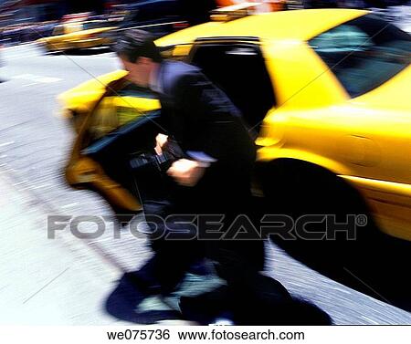 BUSINESSMAN LEAVING. TAXI CAB MANHATTAN. NEW YORK. USA View Large Photo Image Stock Photograph - BUSINESSMAN LEAVING. TAXI CAB MANHATTAN. NEW YORK. USA. Fotosearch