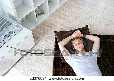 Picture - calm, chilling out, carpet, at-home. Fotosearch