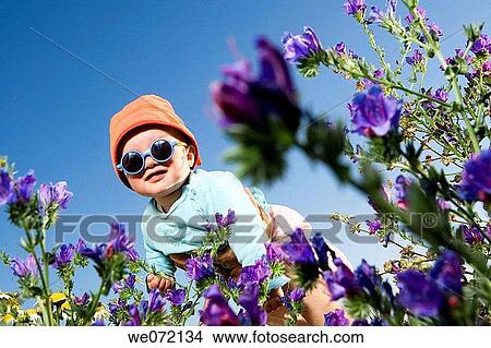 child, baby, boy, blue sky, blue, amusing View Large Photo Image Picture - child, baby, boy, blue sky, blue, amusing. Fotosearch