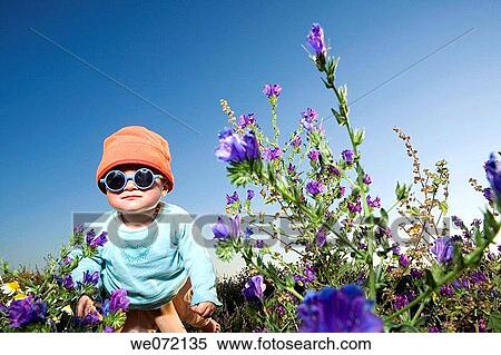 child, baby, boy, blue sky, blue, amusing View Large Photo Image Stock Photography - child, baby, boy, blue sky, blue, amusing. Fotosearch