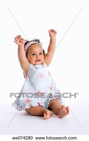 childhood, baby, child, brunette, barefoot, Arms raised View Large Photo Image Stock Image - childhood, baby, child, brunette, barefoot, Arms raised. Fotosearch