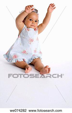 childhood, baby, child, brunette, barefoot, Arms raised View Large Photo Image Stock Image - childhood, baby, child, brunette, barefoot, Arms raised. Fotosearch