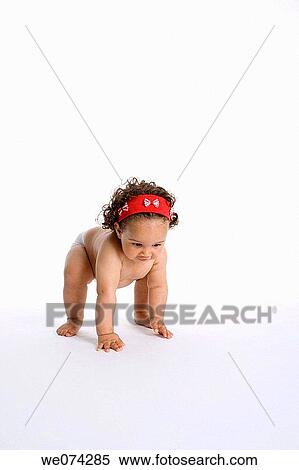 Stock Photography - childhood, baby, child, brunette, barefoot, ability. Fotosearch