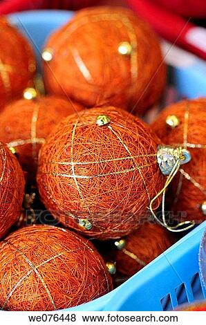 Stock Photo - Christmas balls for sale at Christmas market, Barcelona. Catalonia, Spain. Fotosearch