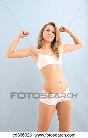 Clenching fist, contemporary, Facial expression View Large Photo Image Stock Photography - Clenching fist, contemporary, Facial expression. Fotosearch