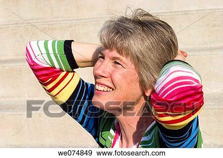 Close-up of a middle-aged woman. View Large Photo Image Stock Photo - Close-up of a middle-aged woman.. Fotosearch