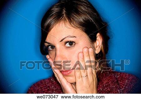 Close-up of a young woman's face. View Large Photo Image Stock Photo - Close-up of a young woman's face.. Fotosearch