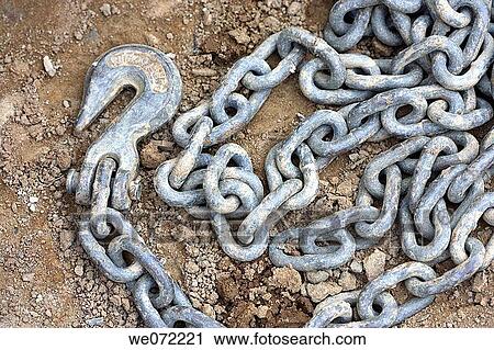 Stock Image - Closeup of construction steel heavy duty chain. Fotosearch