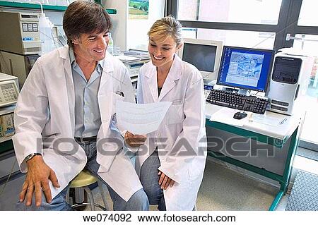Stock Image - colleague, companion, computer. Fotosearch