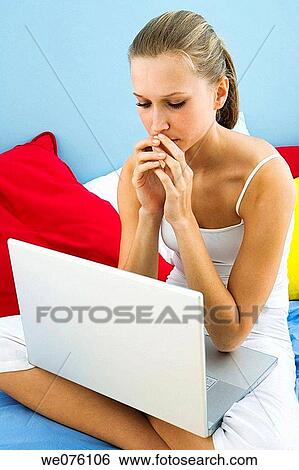 computer, contemporary, cross-legged View Large Photo Image Stock Photograph - computer, contemporary, cross-legged. Fotosearch